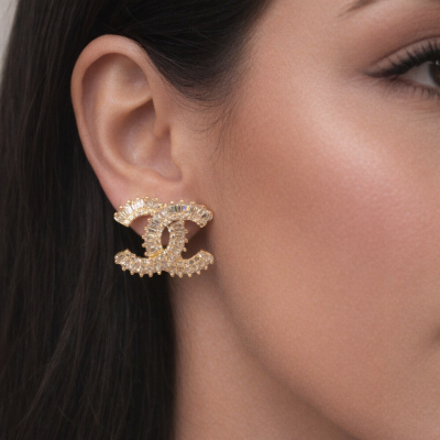 Καρφωτά σκουλαρίκια με σχέδιο σε χρυσό χρώμα