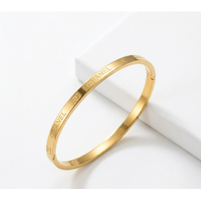 Ατσάλινη χειροπέδα με γράμματα και σχέδιο σε χρυσό χρώμα