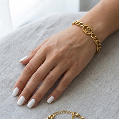 Ιδιαίτερη αλυσίδα βραχιόλι από ατσάλι σε χρυσό χρώμα με ζιργκόν