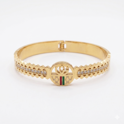 Ατσάλινη χρυσή χειροπέδα με ιδιαίτερο σχέδιο και στρας