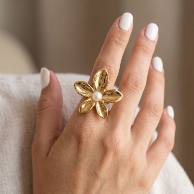 Ατσάλινο δαχτυλίδι με χρυσό λουλούδι και πέρλα