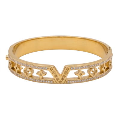 Ατσάλινη χειροπέδα με σχέδιο "v" σε χρυσό χρώμα 